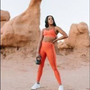 Zyia Orange ribbed leggings size 4